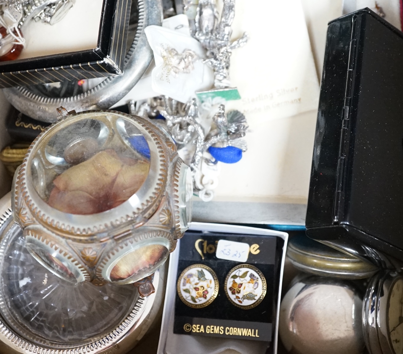 A large quantity of assorted costume jewellery including modern silver miniature figures etc. Condition - fair